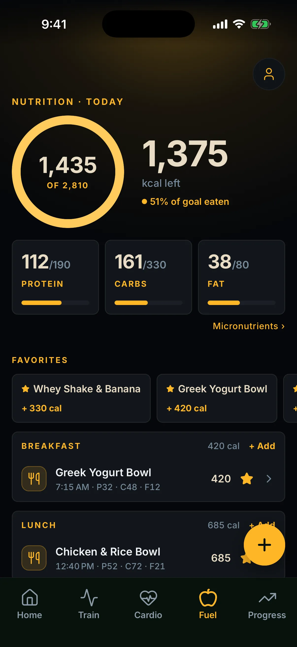 Ovix fuel screen: 1,435 of 2,810 calories eaten with 1,375 left, protein, carb, and fat targets with progress bars, favorite meals, and logged breakfast and lunch